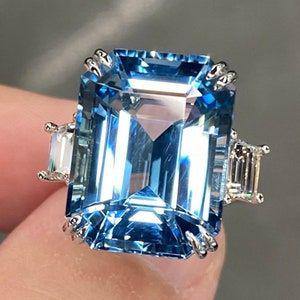 Vintage-style ring with cubic blue crystal