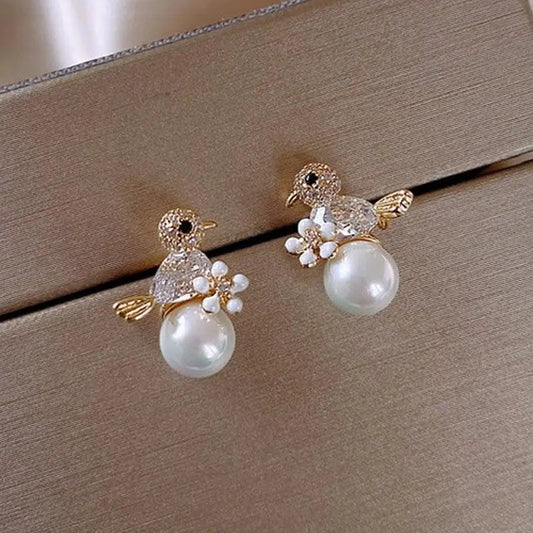 Luxurious Birdie Earrings with Cubic Zirconia and Pearl Inlays Unique Joyas