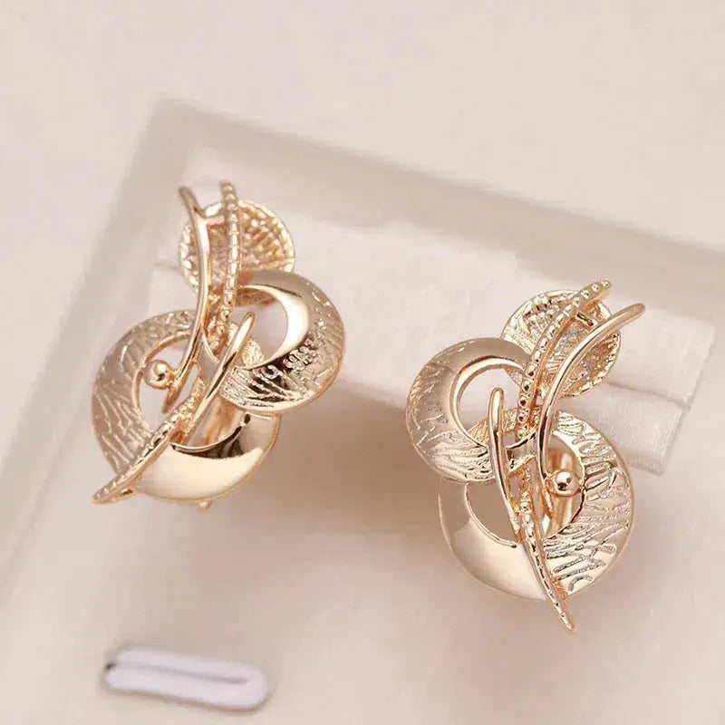 Golden Earrings in Irregular Shape Unique Joyas