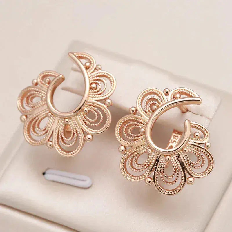 Elegant earrings with flowers in gold Unique Joyas