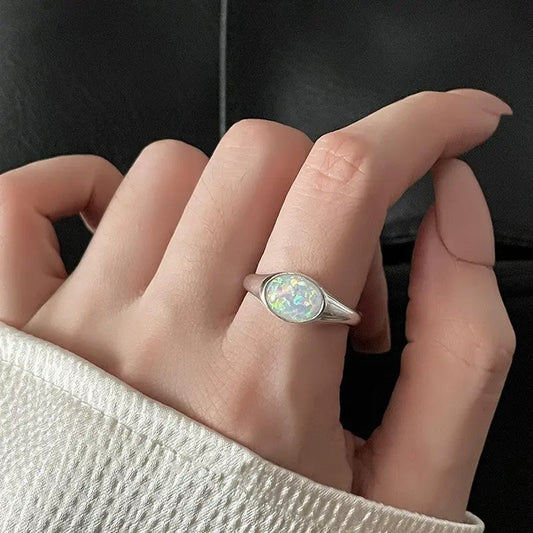 Classic silver ring featuring a single pearl