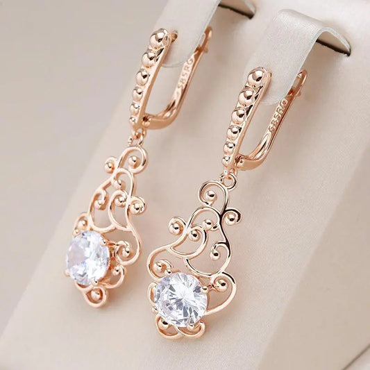 Elegant gold earrings with crystal Unique Joyas