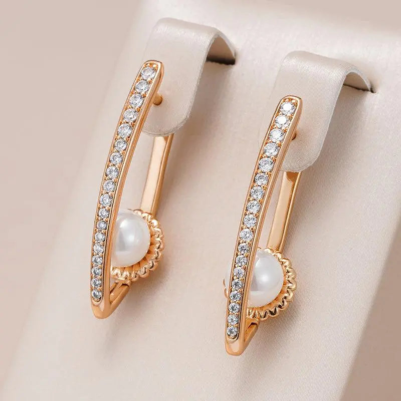 Elegant earrings with rhinestones and pearls Unique Joyas