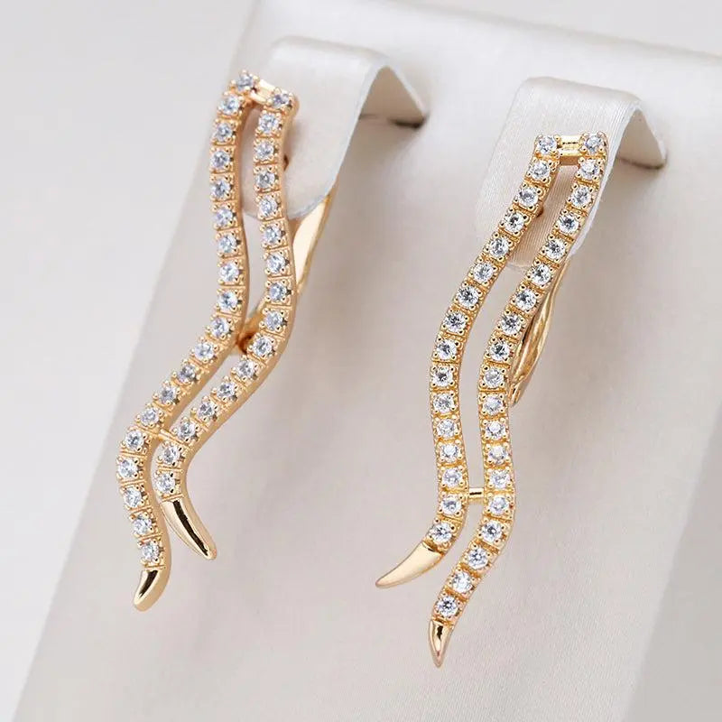 Wavy Golden and Shiny Earrings Unique Joyas