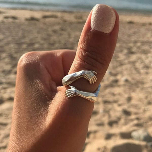 Silver adjustable hug ring