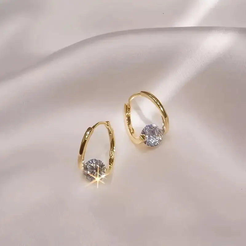 Elegant ear studs in a simple style with zirconia