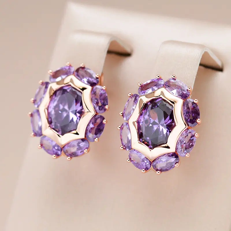 Small gold earrings with purple crystal flowers Unique Joyas