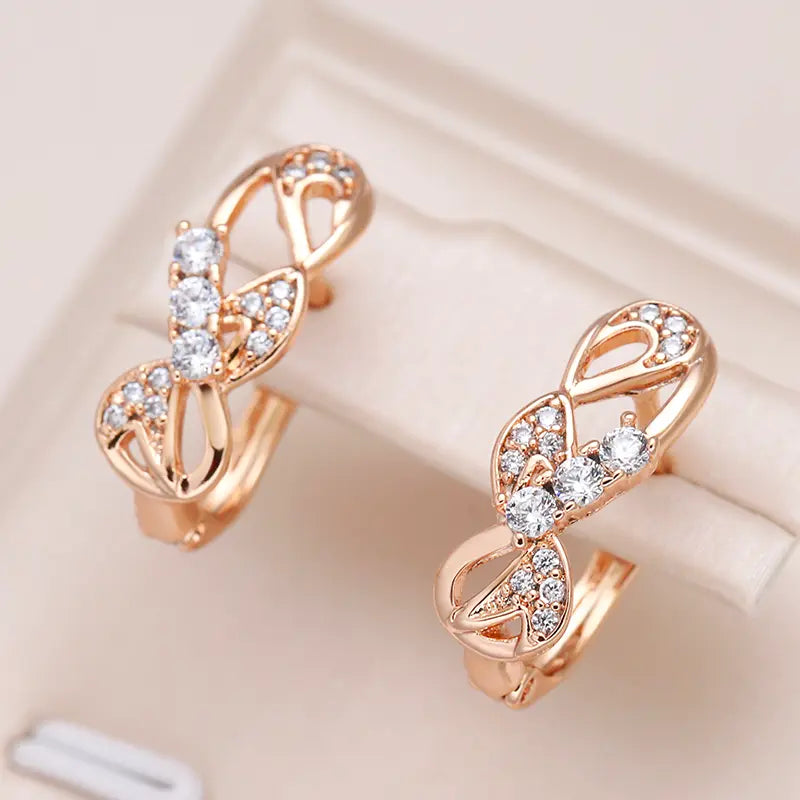 Crystal earrings with gold bow Unique Joyas