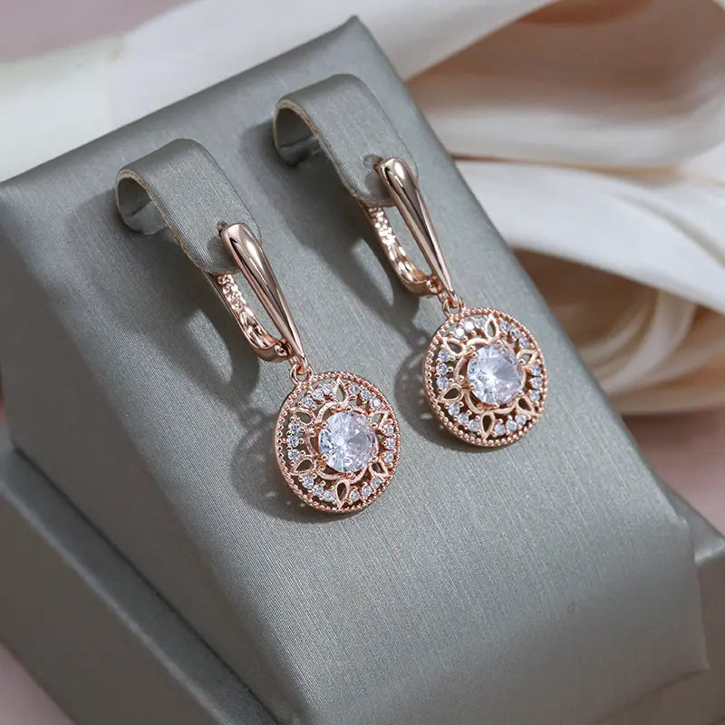 Elegant gold earrings with crystal loops Unique Joyas