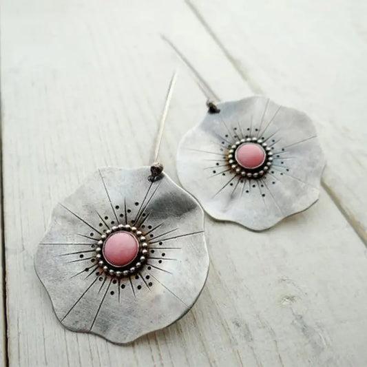 Vintage earrings with silver flower petals and red stone