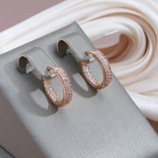 Elegant shiny earrings made of gold and zirconia Unique Joyas