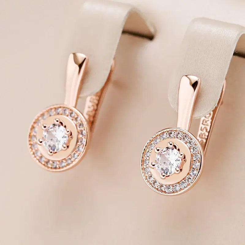 Elegant round earrings in white crystal in gold Unique Joyas