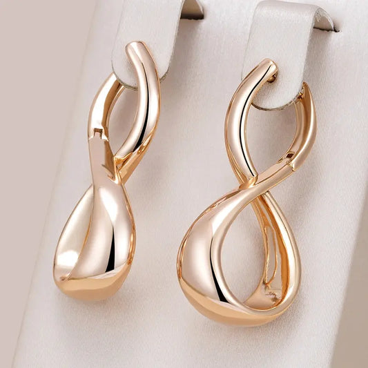 Gold-colored wavy earrings