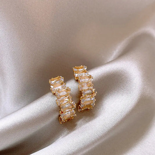 Elegant earrings with zirconium crust in gold Unique Joyas