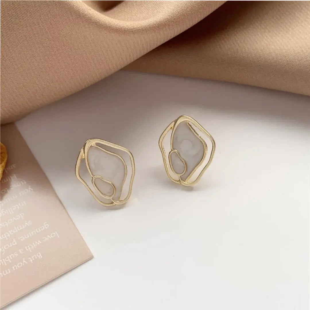 Elegant white earrings Unique Joyas