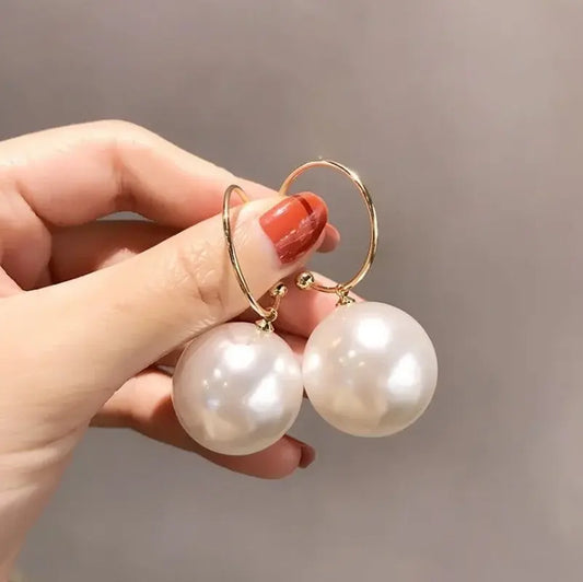 Elegant large pearl earrings Unique Joyas