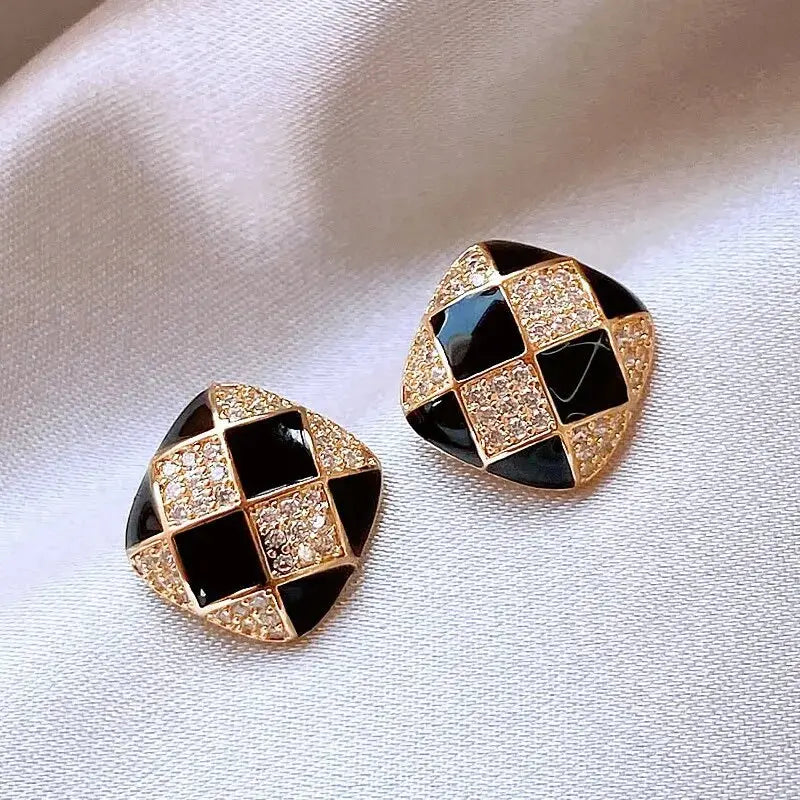 Elegant earrings made of shiny black enamel