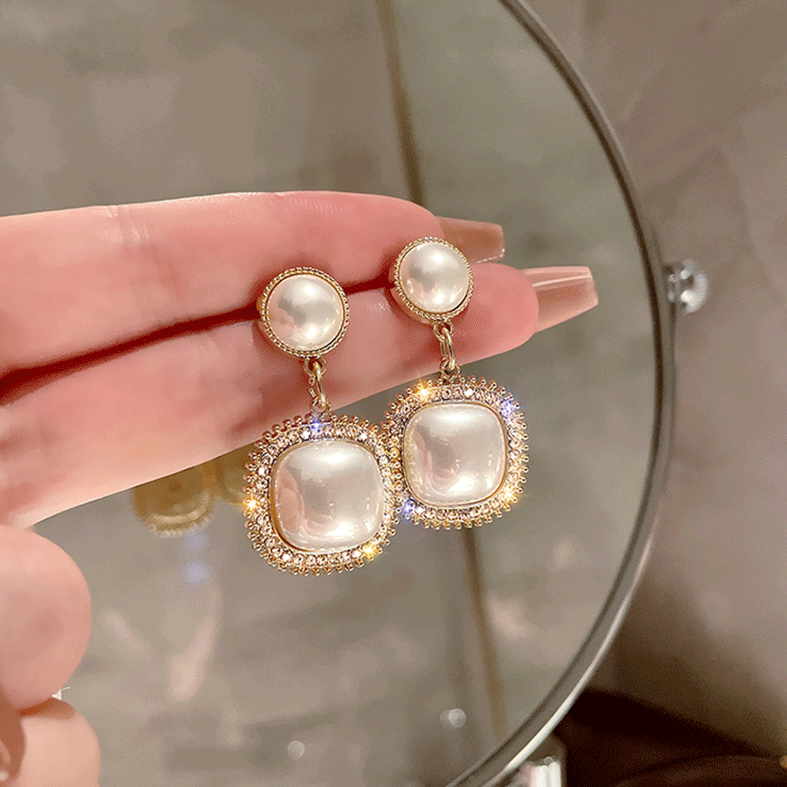 Elegant bright square pearl earrings