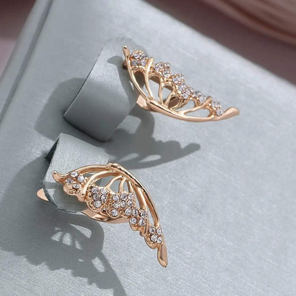 Elegant earrings with shiny wings Unique Joyas