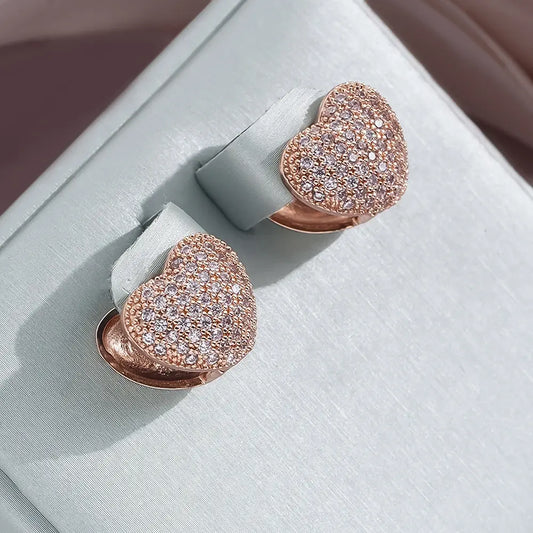 Elegant gold-colored heart earrings Unique Joyas