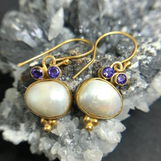 Vintage earrings with pearl and gold inlays