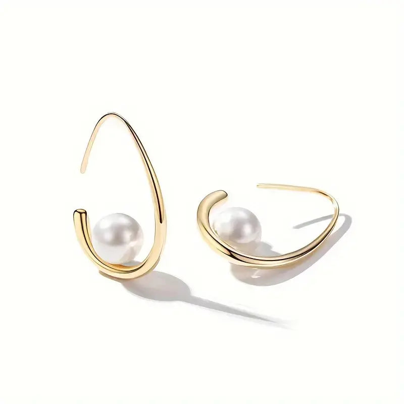 Elegant earrings made of pearls and gold Unique Joyas