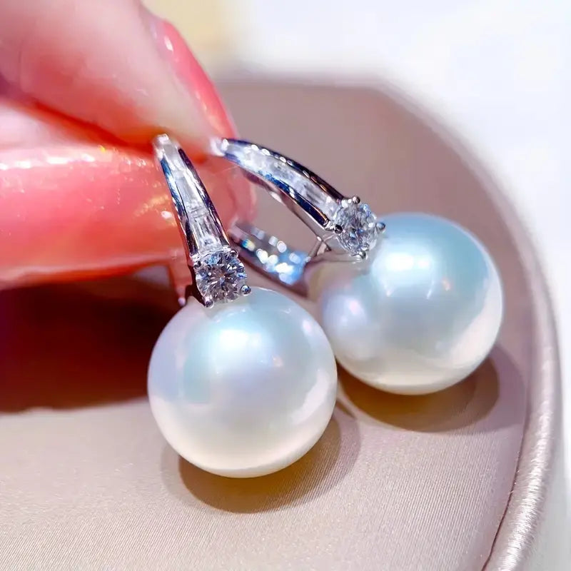 Elegant pearl earrings in shiny silver Unique Joyas