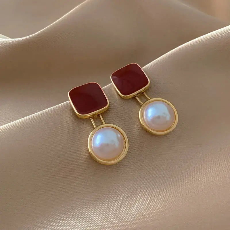 Elegant earrings in red and pearls Unique Joyas