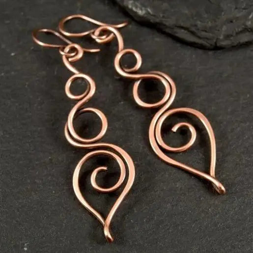 Vintage dangling hollow bronze earrings Unique Joyas