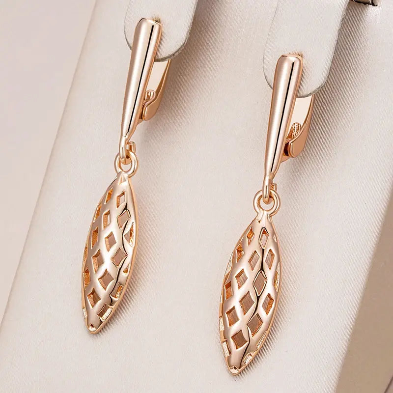 Hollow elegant gold-plated dangling earrings Unique Joyas