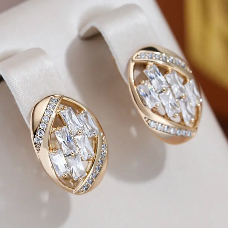 Elegant round white crystals in gold earrings Unique Joyas