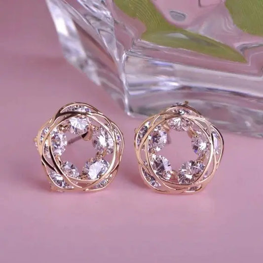 Elegant earrings made of gold and crystal Unique Joyas