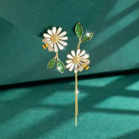 Elegant dangling daisy earrings Unique Joyas