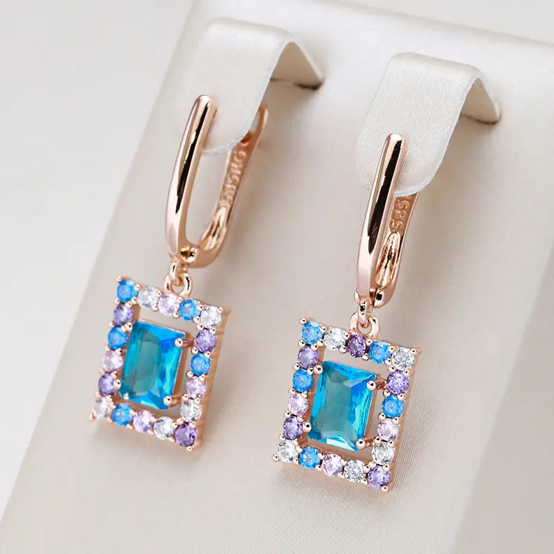 Elegant earrings in blue cubic crystal in gold Unique Joyas